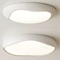 Modern White Round Flush Mount Ceiling Light With Wavy Surface And Soft Glow Design 3d model
