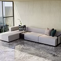 Modern Unique shaped Sofa In Light Gray With Accent Pillows Side Table And Marble Floor 3d model