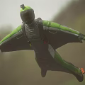 Man In Green Gray Jumpsuit And Helmet Skydiving In Mid Air Freefall Position