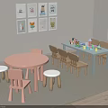 Wooden Children's Chairs With Round Table In Kids Play Area And Cartoon Art