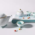 Elegant White Ceramic Tea Set With Teapot Teacups Tray Gold Accents And Decorative Beads
