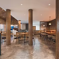 Modern Restaurant Interior With Wooden Columns Tables Chairs Staircase And Gray Floor