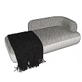 Modern Beige Chaise Lounge With Gray Knit Blanket And Soft Upholstery
