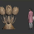 Large Bronze Tulip Sculpture Art Installation With Woman Viewing In Modern Space