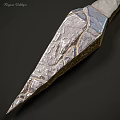 Handcrafted Metallic Dagger Weapon With Ring Pommel And Textured Blade