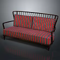 Friends Relaxing Together On Comfortable Striped Sofa In Living Space