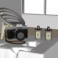 Fujifilm Digital Camera Display With Two Lit Candles On White Table Top