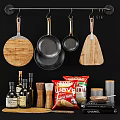 Modern Kitchen Cookware Display Including Hanging Pans Cutting Boards And Spice Jars