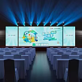 Modern Conference Hall Setup With Large Screens Stage Lights And Arranged Seats