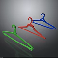 Colorful Plastic Clothes Hangers In Green Red Blue For Wardrobe Organization