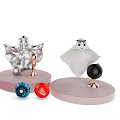 Decorative Ornament Set With Silver White Hooded Figures Colorful Spheres And Pink Bases