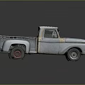 Vintage Weathered Blue Pickup Truck With Single Cab And Rustic Exterior
