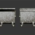 Two Rustic Metal Trash Bins With Lids And Wheels On Gray Background