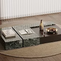 Modular Marble Coffee Table With Books Vase And Fruit Bowl On Jute Rug