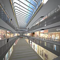 Modern Shopping Mall Interior With Glass Skylight Multi Level Walkways And Bright Storefronts