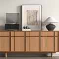 Light Wooden Cabinet With Black Speaker Laptop Books Decorative Painting And Table Lamp