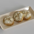 Three Round Bread Loaves with Cross Slashes on Light Rectangular Ceramic Tray 3d model