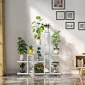 Bright Indoor Garden Decor With Multi Tiered Shelves Potted Plants And Wall Art