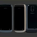 Three Nokia Mobile Phones In Blue Gold Dark Blue With App Icons On Screen