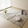 Square Light Colored Textured Rug With White Flower Vase Magazines and Scarf On Wooden Floor