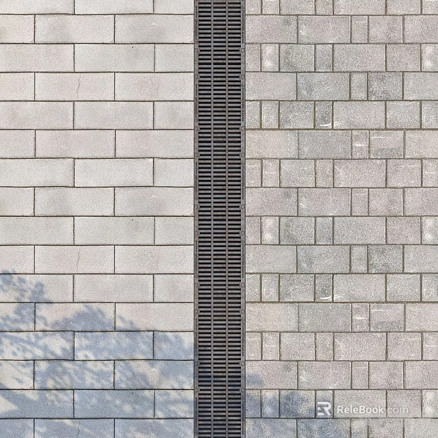 Gray Brick Paved Municipal Road With Central Drainage Grille And Smooth Surface 3d model