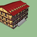 Traditional Three Story Building Featuring Yellow Exterior Red Balconies And Multiple Windows