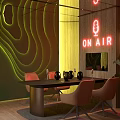 Modern Interior With Green Wavy Neon Wall ON AIR Sign Black Table Brown Chairs Plants
