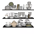 Elegant Assorted Tableware Set Displayed on Shelves with Plates Cups Teapot and Glassware