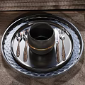 Sleek Black Dinnerware Set With Plates Cups Cutlery Wine Glasses And Decorative Elements 3d model