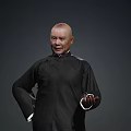 Bald Man Wearing Black Traditional Robe Standing Against Dark Gray Background