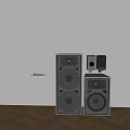 Modern Black Audio Speakers With Floor Standing And Bookshelf Models On Wooden Floor