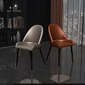 Modern Stylish Dining Chairs With White Orange Upholstery And Black Metal Legs