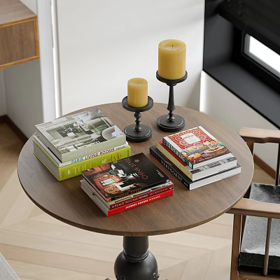 Colorful Books And Magazines On Round Wooden Table With Black Candle Holders And Yellow Candles 3d model