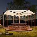 Campsite With White Tent Roof String Lights And Wooden Platform On Grassland