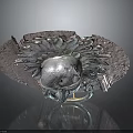 Character And Creature Sculpture With Silver Metallic Body And Radiant Ornamental Details On Dark Surface