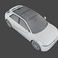Silver Electric Crossover Car With Sleek Body LED Headlights And Alloy Wheels
