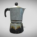 Vintage Metal Moka Pot With Black Handle And Burnt Bottom Design