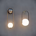 Modern Contemporary Wall Sconces With Gold And Black Metal Frames And Circular Illuminated Shades