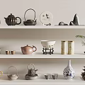 Various Tea Set Display with Teapots Teacups Plates Jars and Plants on Multi Tiered Shelves
