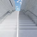 Modern Geometric Museum Architecture Featuring White Buildings Green Roofs And Open Courtyard