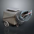 Old Metal Wheeled Industrial Equipment With Coiled Cables And Top Panel