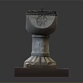 Intricately Carved Stone Pillar with Floral Patterns Ornate Top on Red Black Checkered Base
