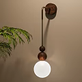 Modern Wooden Wall Lamp With Hanging Wooden Balls White Spherical Shade And Green Plant