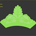 Yellow And White Decorative Ornament Featuring Intricate Leaf And Floral Designs