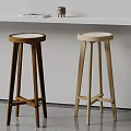 Two Wooden Bar Stools With Round Seats Different Wood Tones Modern Interior White Countertop