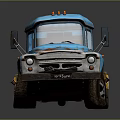 Vintage Blue and Yellow Truck with Weathered Exterior and Classic Design Features
