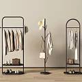 Black Metal Clothes Racks With Tree Shaped Design Hanging Coats Hats Bags And Shoes