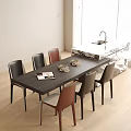 Modern Open Kitchen Dining Table And Chairs With Mixed Color Seats Napkins And Magazines