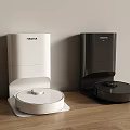 Roborock White And Black Robot Vacuum Cleaners On Modern Wooden Floor