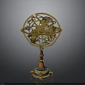 Golden Decorative Armillary Sphere With Brown Marble Base And Ornate Details